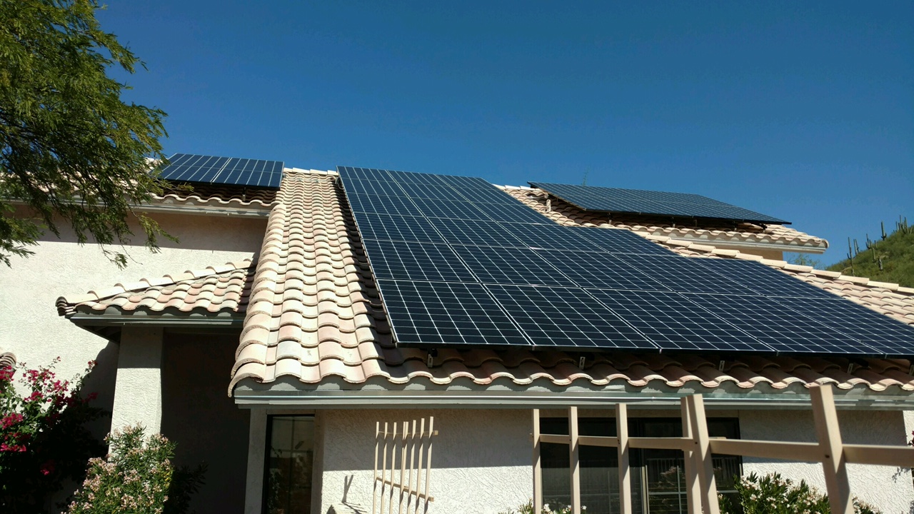 Photo of solar panels on rooftop, TOPCU green loans program